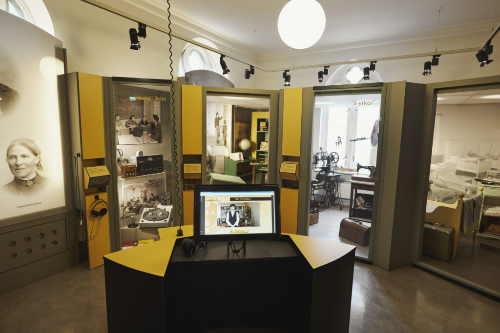 A view of the gallery featuring historic exhibits related to D/deaf culture